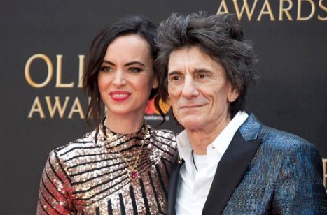 Ronnie Wood with his current wife Sally Humphreys during an event. 